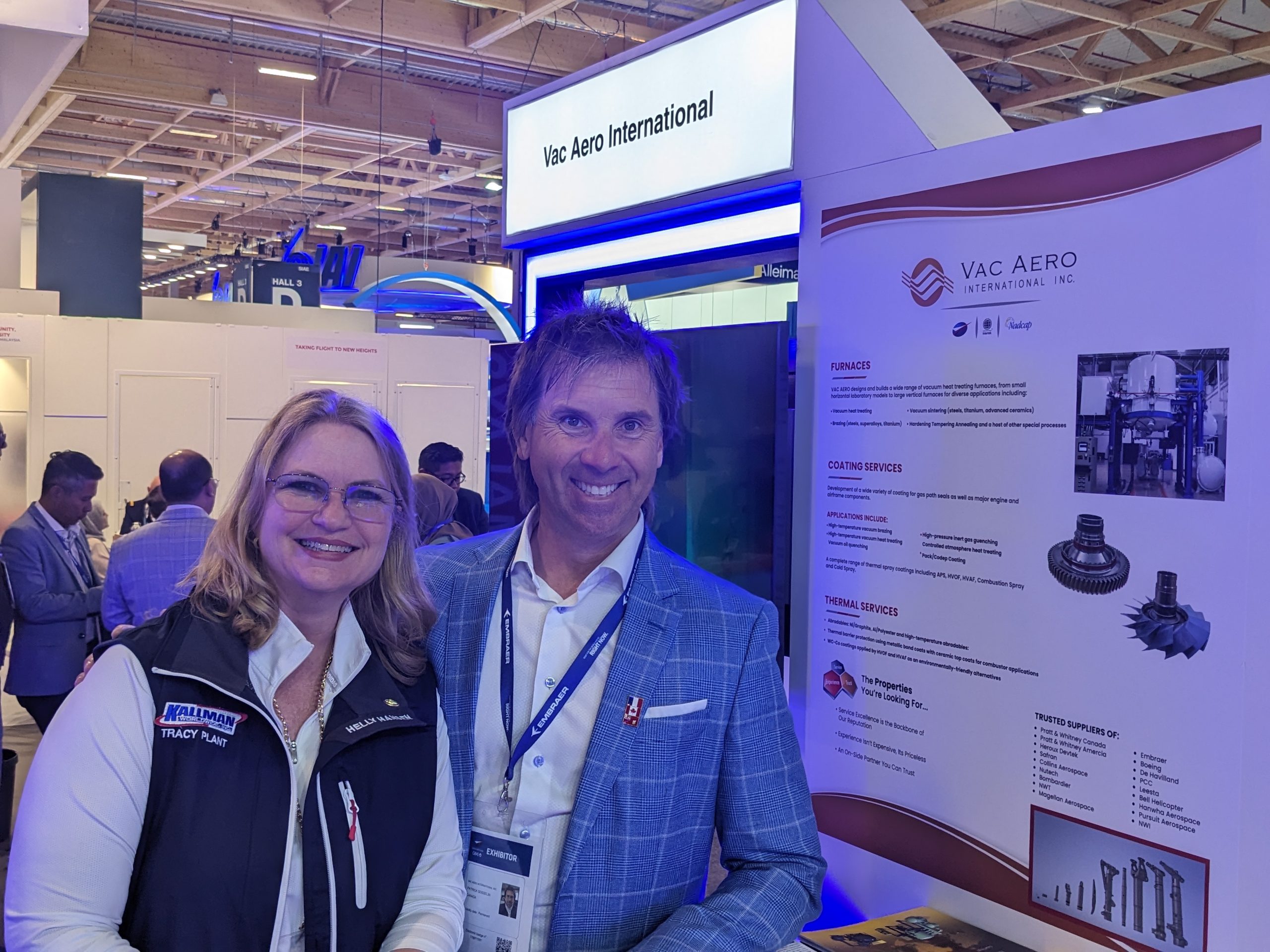 Tracy visits with Patrick Gosselin, VP Surface Treatments at VAC AERO International, during the 2023 Paris Air Show.